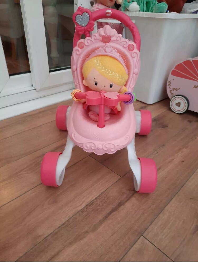 pram walker with doll